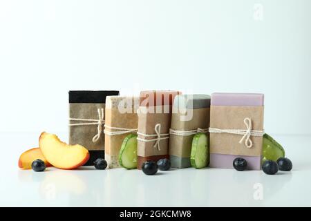 Different natural soap for skin care on white table Stock Photo