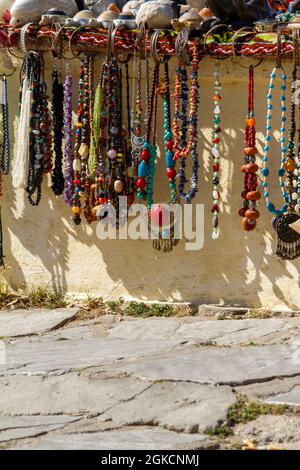 Selling Moroccan necklaces and jewelry on the street Stock Photo