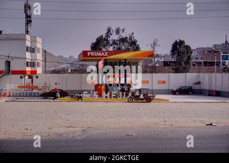 Lima, Peru - July 27, 2021: Primax gas station with few customers Stock Photo