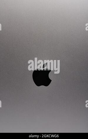New york, USA - September 3 2021: Apple logo on metal grey surface of ipad or macbook pro surface close up view Stock Photo