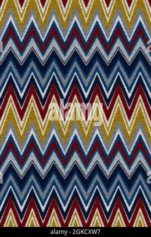 Realistic zig-zag chevron knitted stripes. Seamless repeating pattern. Stripes in yellow, red, and blue. Stock Photo