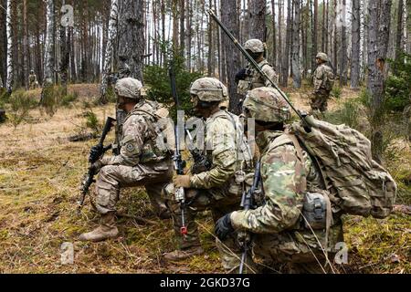 U.S. Soldiers assigned to 3rd Squadron, 2nd Cavalry Regiment provide security during platoon external evaluations at the Grafenwoehr Training Area, Germany, March 17, 2021. Wolf Strike 21 is a platoon external evaluation to certify the lethality of platoons through squad training and live fire exercises. Stock Photo