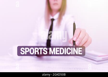 Handwriting text Sports Medicine. Business idea treatment and prevention of injuries related to sports Developer Discussing Gadget Upgrade, Presenting Stock Photo