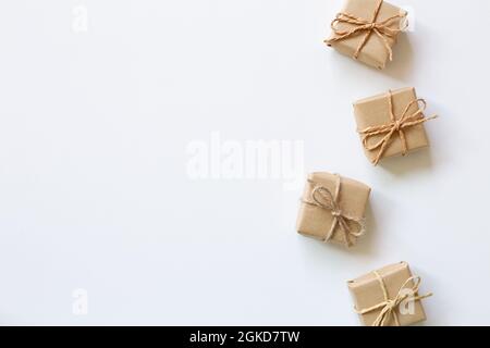 Brown gift boxes on white background. flat lay, top view, copy space Stock Photo