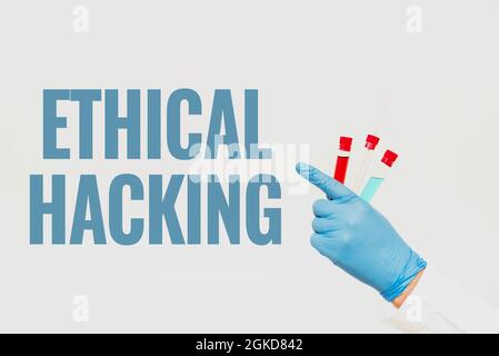 Text sign showing Ethical Hacking. Business overview act of locating weaknesses and vulnerabilities of computer Researcher Displaying Virus Prevention Stock Photo