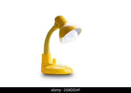Side view of yellow desk lamp isolated on white background with clipping path Stock Photo