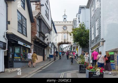 East Gate Tudor arch and clock tower over Totnes High Street, Devon was once the entrance to the medieval town Stock Photo