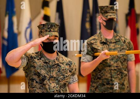 U.S. Marine Corps Capt. Robert Schuller, left, company commander