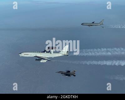 Nato E 3 Awacs Sentry Aircraft Flies Over The Canadian Arctic With U S Air Force F 16 And Kc 46a Pegasus Tanker During North American Aerospace Defense Command S Arctic Air Defense Exercise Amalgam Dart 21 2