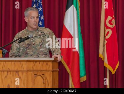 U.S. Army Col. John J. Herrman, commander of Area Support Group – Kuwait, addresses the audience during the Women's History Month observance closing ceremony at Camp Airfjan, Kuwait, March 24, 2021. Stock Photo