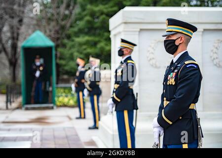 Soldiers from the 3d U.S. Infantry Regiment (The Old Guard) support an Army Full Honors Wreath-Laying Ceremony at the Tomb of the Unknown Soldier in honor of Medal of Honor Day at Arlington National Cemetery, Arlington, Virginia, March 25, 2021. Stock Photo