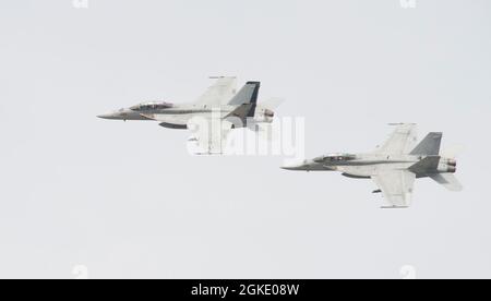 VIRGINIA BEACH, Va. (Mar. 25, 2021) Cmdr. Bryan Pinckney, Commanding Officer of Strike Fighter Squadron (VFA) 213, relieves Cmdr. Lelsie A. Mintz, during an aerial change of command ceremony at Naval Air Station (NAS) Oceana. Mintz commanded VFA-213 from 2019 to 2021. Stock Photo