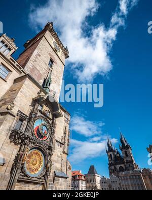 The Astronomical Clock, Prague, Czech Republic.Low, wide angle view of the famous landmark with the background Tyn Church in the Czech capital. Stock Photo