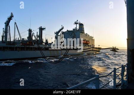 USS Philippine Sea conducts a replenishment-at-sea Stock Photo - Alamy