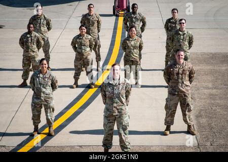 Members of the 2nd Logistics Readiness Squadron stand at the position of parade rest for a staff photo at Barksdale Air Force Base, Louisiana, March 25, 2021. The 2nd LRS provides supply and transportation support to various units on base. Stock Photo