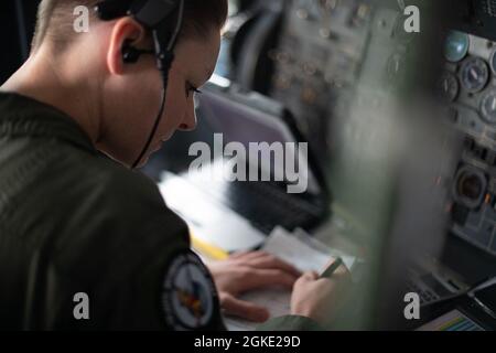 U.S. Air Force Tech. Sgt. Blakeley Murdock, 6th Air Refueling Squadron flight engineer, performs preflight procedures before the Women’s History Month heritage flight March 25, 2021, at Travis Air Force Base, California. In honor of Women's History Month, an all-female flight crew from the 6th ARS flew on an aerial refueling training mission eastbound to Wyoming and Naval Air Station Fallon. Stock Photo