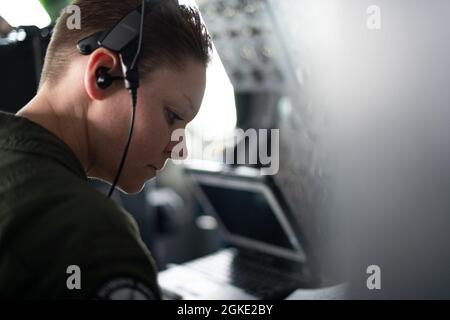 U.S. Air Force Tech. Sgt. Blakeley Murdock, 6th Air Refueling Squadron flight engineer, performs preflight procedures before the Women’s History Month heritage flight March 25, 2021, at Travis Air Force Base, California. In honor of Women's History Month, an all-female flight crew from the 6th ARS flew on an aerial refueling training mission eastbound to Wyoming and Naval Air Station Fallon. Stock Photo