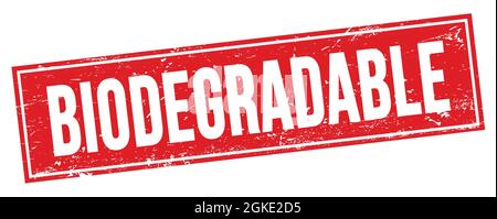 BIODEGRADABLE text on red grungy rectangle stamp sign. Stock Photo