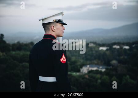 U.S. Marine Corps Lance Cpl. Jeremy Schutters, originally from Saratoga, California, a small arms repair technician, with Combat Logistics Battalion 453, Marine Corps Forces Reserve, poses for a photo in San Jose, California March 25, 2021. Schutters is currently attending De Anza College and studying administration of justice. As a reservist, Schutters has the opportunity to pursue his dream job as a Santa Clara county sheriff while also serving his country as a United States Marine. Stock Photo