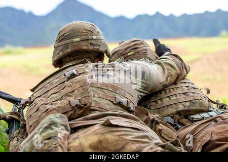 Soldiers assigned to A Company, 29th Brigade Engineer Battalion, 3rd Infantry Brigade Combat Team, 25th Infantry Division conduct squad live fire exercise training lanes at Schofield Barracks, Hawaii on March 30, 2021. Stock Photo