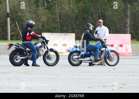 Eric Kruizenga, an instructor with American Motorcycle Training (right), coaches Basic RiderCourse students on Corry Station, March 30. The Basic RiderCourse is a Level I course designed for the new rider or a rider needing a motorcycle endorsement on their license. Stock Photo