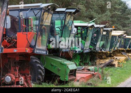 Combine harvester reclamation yard, Battle Bridge Farm, Alnwick, Northumberland, UK Stock Photo