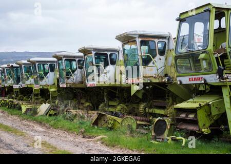 Combine harvester reclamation yard, Battle Bridge Farm, Alnwick, Northumberland, UK Stock Photo