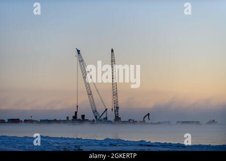 Construction Marine offshore works. Dam building, crane, barge, dredger. Breakwater construction. Stock Photo