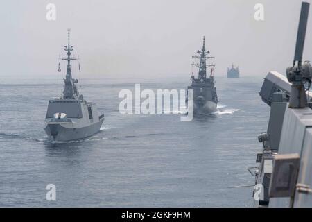 210407-N-JC800-1074   INDIAN OCEAN (April 7, 2021) - Amphibious transport dock ship USS Somerset (LPD25) conducts formation maneuvers with (from left to right) FS Surcouf, JPN Akebono and HMAS Sirius during La Perouse 2021. La Perouse is an exercise conducted during the annual French Navy midshipman deployment called Mission Jeanne d'Arc. The exercise is designed to conduct training, enhance cooperation in maritime surveillance, maritime interdiction operations, and air operations. As the U.S. Navy's largest forward-deployed fleet, 7th Fleet employs 50-70 ships and submarines across the Wester Stock Photo