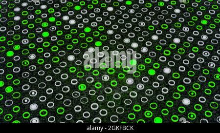 Rotating surface of green and white blinking circles on a dark grey background, seamless loop. Animation. Energy waves covering the field of narrow ro Stock Photo