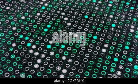 Rotating surface of green and white blinking circles on a dark grey background, seamless loop. Animation. Energy waves covering the field of narrow ro Stock Photo