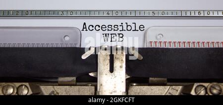 Accessibility and accessible WEB symbol. Concept words 'Accessible WEB' typed on old retro typewriter. Diversity, inclusion, belonging and accessible Stock Photo