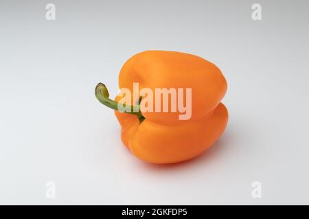 Orange bell pepper isolated on white background Stock Photo