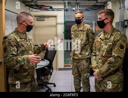 Airmen with the 2nd Combat Weather Systems Squadron held a ribbon ...