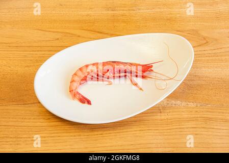 Super cooked red prawn from Huelva on a white plate Stock Photo