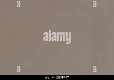 Brown color wrapping paper sheet abstract background. Full frame. Copy Space. Stock Photo