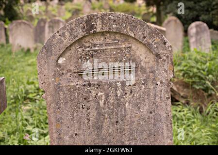 A carving of a guards van on the gravestone of Samuel Mansell, a guard of the London & South Western Railway, who died in an accident in March 1879 Stock Photo