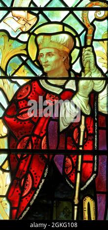 St Aidan of Lindisfarne, Irish monk, missionary, apostle, bishop, 7th century, stained glass window, by J Powell & Son, 1900, Blakeney, Norfolk Stock Photo