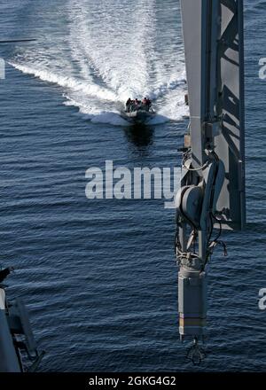 Lpd Rhib Sailors drive a rigid-hull inflatable boat during visit, board, search ...