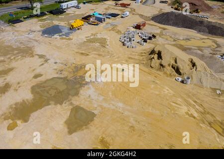 Aerial view at work preparing ground for new housing in process on construction site Stock Photo