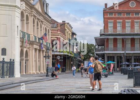 NEW ORLEANS, LA, USA - SEPTEMBER 24, 2020: Tourists in Jackson Square amidst Historic Buildings Stock Photo