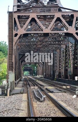 The Clinton Railroad Bridge competed in 1909 between Iowa and Illinois over the Mississippi River. Stock Photo