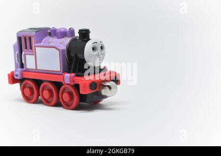 Die cast model of Rosie from Thomas the Tank Engine  set against a white background. Copy space is available Stock Photo