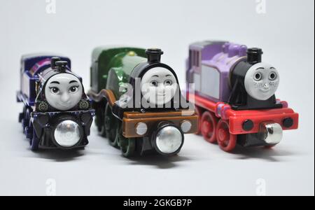 Three strong female engines from Thomas the tank engine series  set against a white background. Stock Photo