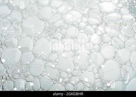 Soap foam background, bubbles texture close up. Stock Photo