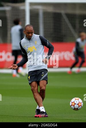 Kirkby, Knowsley, Merseyside, England, 14th September 2021: The  AXA Training Centre, Kirkby, Knowsley, Merseyside, England: Liverpool FC training ahead of Champions League game versus AC Milan on 15th September: Fabinho of Liverpool passes the ball Stock Photo