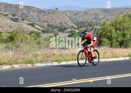 U.S. Marine Corps athlete Capt. Thomas Benge competes in the cycling time trials during the 2021 Regional Marine Corps Trials at Marine Corps Base Camp Pendleton Calif. April 17. The Marine Corps