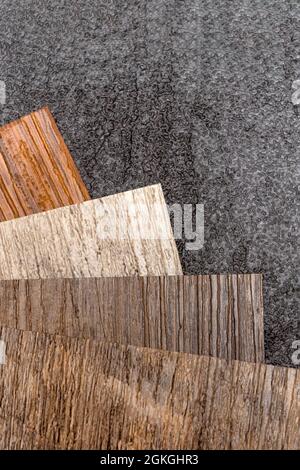 PVC vinyl floor. Samples of vinyl flooring. Collection of vinyl tiles. DIY home items Stock Photo