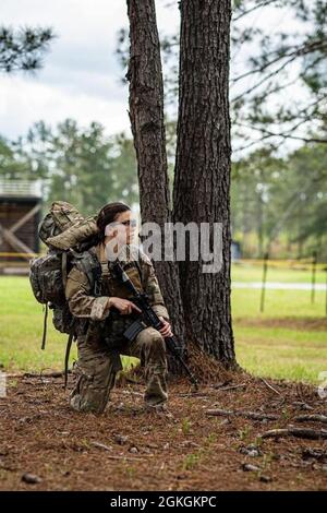 Capt. Christina Plumley, 97th Civil Affairs Battalion, 95th Civil Affairs Brigade, Special Operations, Airborne participates in a culminating exercise during the Reconnaissance Surveillance Leaders Course at Fort Benning, Ga. Plumley became the first female to graduate from the course on April 16, 2021. Stock Photo