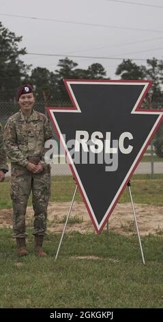 Capt. Christina Plumley, 97th Civil Affairs Battalion, 95th Civil Affairs Brigade, Special Operations, Airborne, becomes the first female to graduate from the Reconnaissance Surveillance Leaders Course at Fort Benning, Ga., April 16, 2021. “This was important to me because I wanted to set an example for other women in the military who might have been discouraged from attending RSLC before knowing that no female has passed the course, that it was a possibility for women to graduate.” Stock Photo